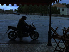 The girl waits for Dean Corso in front of the hotel